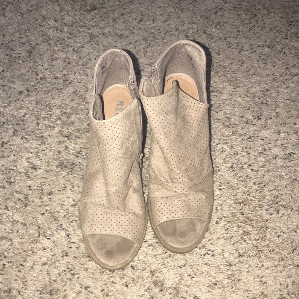 Perforated peep toe booties